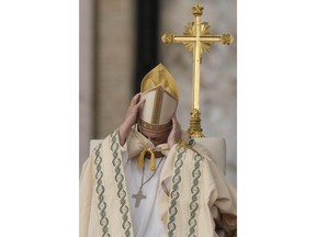 Pope Francis wears his mitre as he celebrates a mass for the canonization of two new saints, Giovanni Battista Scalabrini and Artemide Zatti, in St. Peter's Square at the Vatican, Sunday, Oct. 9, 2022.