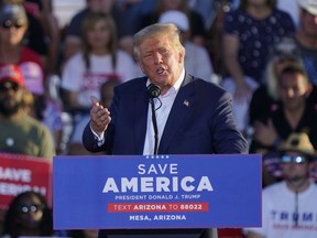 Former President Donald Trump speaks at a rally, Sunday, Oct. 9, 2022, in Mesa, Ariz.