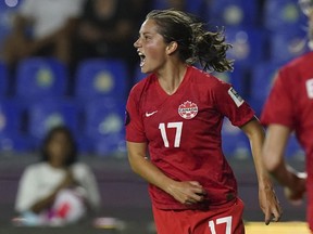 Canada's Jessie Fleming (17) celebrates scoring her side's opening goal against Jamaica during a CONCACAF Women's Championship soccer semifinal match in Monterrey, Mexico, Thursday, July 14, 2022.