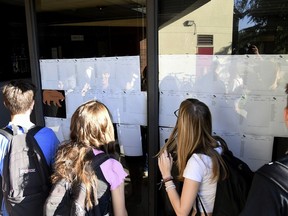 FILE - New students at Bear River High School, in Grass Valley, Calif., gather to see their school schedules during the first morning of school, Tuesday, Aug. 16, 2022, for the 2022-2023 school. ACT test scores made public in a report Wednesday, Oct. 12, 2022, reveal a decline in preparedness for college-level coursework.