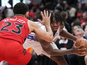 Philadelphia 76ers' Tyrese Maxey (right) looks to make a play around Toronto Raptors' Fred VanVleet during second half NBA basketball action in Toronto on Friday, October 28, 2022.