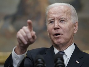 President Joe Biden calls on a reporter for a question after speaking about deficit reduction in the Roosevelt Room at the White House in Washington, Friday, Oct. 21, 2022.