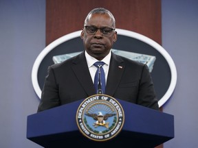 Defense Secretary Lloyd Austin listens to a question during a briefing at the Pentagon in Washington, Thursday, Oct. 27, 2022.