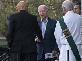 President Joe Biden leaves St. Edmund Roman Catholic Church in Rehoboth Beach, Del., after attending Mass, Saturday, Oct. 22, 2022.