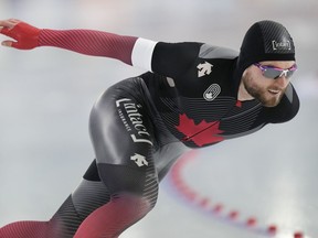 Canada's Laurent Dubreuil competes in the men's 1,000-meter speedskating race of the World Cup final in Thialf ice rink, Heerenveen, Netherlands, Saturday, March 12, 2022. Laurent Dubreuil blazed his way to being national champion in the men's 500-metre long track speedskating race on Thursday.