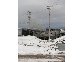 Two investigators from the Nunavut Fire Marshall's Office have arrived in Naujaat on Hudson Bay to investigate a fire that destroyed the hamlet's community centre, which is seen in a Saturday, Oct. 8, 2022, handout photo.