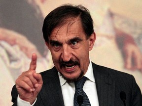Then-Italian Defence Minister Ignazio La Russa gestures during a news conference at Chigi Palace in Rome.