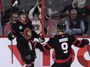 Ottawa Senators left wing Tim Stutzle (18) celebrates his second goal of the game with centre Josh Norris (9) during third period NHL hockey action against the New Jersey Devils in Ottawa, on Tuesday, April 26, 2022. Tim Stutzle recorded a goal and two assists as the Ottawa Senators won their third consecutive game over the Montreal Canadiens 4-3 on Thursday at Steele Community Centre.