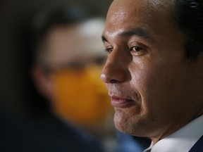 Manitoba NDP leader Wab Kinew speaks to media after the Speech from the Throne at the Manitoba Legislature in Winnipeg, Wednesday, October 7, 2020. Kinew says he will consider banning replacement workers during strikes and lockouts if he becomes premier.