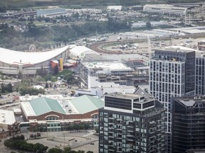 A view of the Calgary Stampede grounds and the Saddledome seen from the Telus Sky building in Calgary, Alta., Wednesday, July 6, 2022.&ampnbsp;Alberta's premier has stated her support for a new arena in Calgary to house the NHL's Flames and wants the province to get involved.