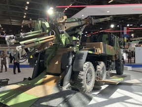 FILE - A French artillery piece Caesar is photographed at the Eurosatory land and airland defense and security trade fair on June 13, 2022 in Villepinte, north of Paris. France on Sunday, Oct. 16, 2022 pledged air defense systems to protect Ukrainian cities against drone strikes and an expanded training program for Ukrainian soldiers as it seeks to puncture perceptions that French President Emmanuel Macron's government has lagged in supporting Ukraine militarily against the Russian invasion.