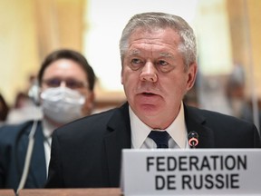 FILE - Russian ambassador Gennady Gatilov speaks at the opening of the 49th session of the UN Human Rights Council in Geneva, Switzerland, on, Feb. 28, 2022. The U.N.'s top human rights body has voted Friday to appoint an independent expert to step up scrutiny of Russia's rights record at home. Russian ambassador Gennady Gatilov lashed out at the draft of the proposal as a "despicable document" and said its real aim was "to find yet another way of exerting leverage for bringing pressure to bear on Russia."