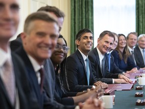 Britain's Prime Minister Rishi Sunak, center, holds his first Cabinet meeting in Downing Street in London, Wednesday, Oct. 26, 2022.