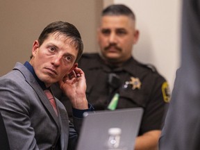 Ex-Grand Rapids police officer Christopher Schurr appears for the second day of his preliminary examination at the Kent County Courthouse in Grand Rapids, Mich., on Friday, Oct. 28, 2022. Schurr is charged with second-degree murder for fatally shooting Black motorist Patrick Lyoya in the back of the head on April 4.