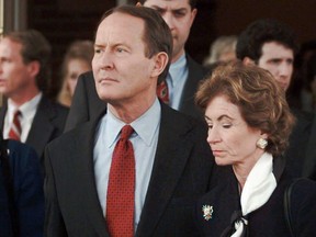FILE - Lamar Alexander, left, and his wife Honey, leave funeral services for Sarah Cannon, better known as Minnie Pearl, at Brentwood United Methodist Church in Brentwood, Tenn. Wednesday, March 6, 1996.  The family of former Tennessee governor and U.S. Sen. Lamar Alexander says his wife of 53 years has died at age 77. Known as "Honey," Leslee Kathryn Buhler Alexander died surrounded by her family on Saturday, Oct. 29, 2022 at her home outside Maryville, Tenn.