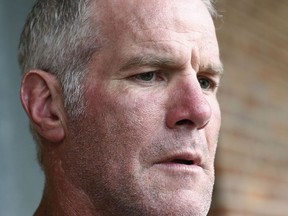 FILE - Former NFL quarterback Brett Favre speaks to the media in Jackson, Miss., Oct. 17, 2018. The governor of Mississippi in 2017 was "on board" with a plan for a nonprofit group to pay Brett Favre more than $1 million in welfare grant money so the retired NFL quarterback could help fund a university volleyball facility, according to a text messages between Favre and the director of the nonprofit in court documents filed Monday, Sept. 12, 2022.