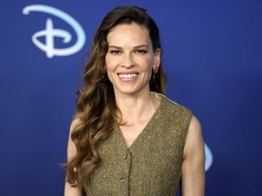 FILE - Hilary Swank attends the Disney 2022 Upfront presentation at Basketball City Pier 36 on May 17, 2022, in New York. Swank announced, Wednesday, Oct. 5, 2022, the she's pregnant with twins and says that revelation might explain some of her wardrobe alterations and other actions on set of her new ABC series "Alaska Daily."