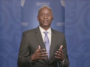 FILE - In this still image from video, Atlanta Federal Reserve Bank President Raphael Bostic speaks from Atlanta during a webinar sponsored by the 12 regional Fed banks to address the lack of racial disparity in the field of economics on Tuesday, April 13, 2021.  Bostic said Friday, Oct. 14, 2022, that many of his financial trades and investments in the past five years inadvertently violated the central bank's ethics rules, and he has revised all his financial disclosures since becoming president in 2017.(AP Photo, File)