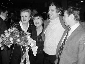 FILE - Actors Angela Lansbury, left, and Len Cariou, right, who starred in the musical "Sweeney Todd" appear with their replacements Dorothy Loudon, second left, and George Hearn at a New York restaurant, prior to their final performance on March 3, 1980. Lansbury died peacefully at her home in Los Angeles on Tuesday, Oct. 11. She was 96.