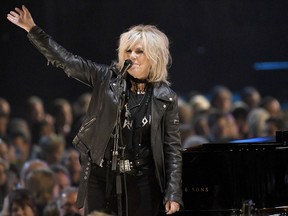 FILE - Lucinda Williams performs at the MusiCares Person of the Year tribute honoring Tom Petty in Los Angeles on Feb. 10, 2017.