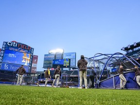 San Diego Padres players take part in batting practice the day before a wild-card baseball playoff game against the New York Mets, Thursday, Oct. 6, 2022, in New York.