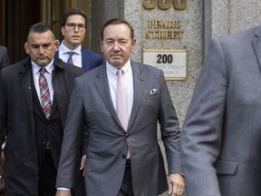 Actor Kevin Spacey, center, leaves court, Monday, Oct. 17, 2022, in New York. Spacey testified that he never made a sexual pass at the actor Anthony Rapp, who has sued, claiming the Academy Award-winning actor tried to take him to bed when he was 14.
