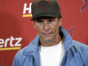 Tampa Bay Buccaneers quarterback Tom Brady meets with reporters after an NFL football game against the Pittsburgh Steelers in Pittsburgh, Sunday, Oct. 16, 2022.