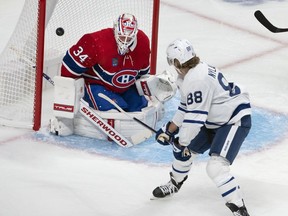 Toronto Maple Leafs right wing William Nylander (88) scores on Montreal Canadiens goaltender Jake Allen (34) during second period NHL preseason action in Montreal on Monday October 3, 2022.