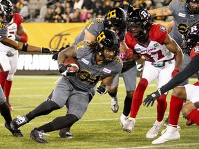 Hamilton Tiger-Cats running back Sean Thomas Erlington (31) carries the ball during first half CFL football game action against the Ottawa Redblacks in Hamilton, Ont. on Friday, October 21, 2022.