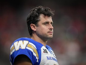Winnipeg Blue Bombers quarterback Zach Collaros, who dressed but did not play, watches from the sideline during the second half of a CFL football game against the B.C. Lions in Vancouver, on Saturday, October 15, 2022. The Blue Bombers have signed star quarterback Collaros to a three-year contract extension, the team announced Tuesday.