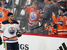 Edmonton Oilers Evander Kane (91) looks at fans as players warm up for Game 2 of the NHL hockey Stanley Cup playoffs Western Conference finals between the Oilers and the Colorado Avalanche on Thursday, June 2, 2022, in Denver.