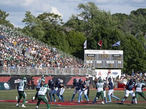 The Toronto Argonauts and the Saskatchewan Roughriders play during the second half of CFL action at Acadia University in Wolfville, N.S., Saturday, July 16, 2022. The CFL's '22 Touchdown Atlantic generated more than $12.7 million in economic benefit to regions of Nova Scotia according to a study commissioned by the league.