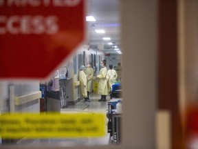 A COVID-19 unit is shown at the Health Sciences Centre in Winnipeg on Tuesday, Dec. 8, 2020. A Manitoba doctor says hospitals are full, health-care workers are quitting and the system is overwhelmed.