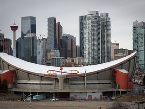 The Saddledome, home of the Calgary Flames, is shown in Calgary, Thursday, March 12, 2020. Calgary and the Flames are talking about a new arena again. The city confirmed Wednesday that Calgary Sport and Entertainment Corporation has re-entered negotiations for a new building.