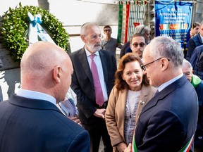 Rome Mayor Roberto Gualtieri, right, President of the Jewish Community of Rome Ruth Dureghello, second from right, and Rome's Chief Rabbi Riccardo Di Segni, center, attend a ceremony outside the Synagogue on the occasion of 79th anniversary of the Nazis deportation of Roman citizens of Jewish religion, in Rome, Sunday, Oct. 16, 2022. On Oct. 16, 1943, German occupation soldiers gathered more than 1,000 Jewish men, women and children from their homes in the Roman Ghetto and deported them to Auschwitz.