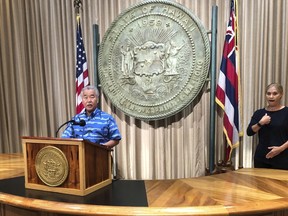 Hawaii Gov. David Ige speaks at a news conference at the Hawaii State Capitol in Honolulu on Tuesday, Oct. 11, 022. Ige signed an executive order Tuesday that aims to prevent other states from punishing their residents who get an abortion in the islands and stop other states from sanctioning local doctors and nurses who provide such care.