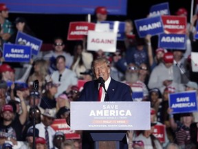 Former U.S. president Donald Trump holds a rally on Sept. 23, 2022, in Wilmington, N.C. Two years since a presidential election defeat he continues to deny, Trump continues to exert outsized influence on the U.S. campaign trail.