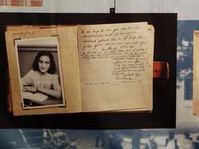 FILE - A photo of Anne Frank is displayed at the opening of the exhibition: "Anne Frank, a History for Today", at the Westerbork Remembrance Centre in Hooghalen, northeast Netherlands, Firday, June 12, 2009. On Saturday, Oct. 15, 20222, Rebecka Fallenkvist, a Sweden Democrats official, was suspended by the far-right party for making degrading comments about Jewish teenage diarist Anne Frank.