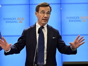Ulf Kristersson, leader of the Moderate Party, speaks during a press conference regarding the formation of the government, at the Parliament in Stockholm, Sweden, Friday Oct. 14, 2022.