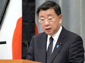 Japan's Chief Cabinet Secretary Hirokazu Matsuno speaks at a press conference in Tokyo Tuesday, Sept. 27, 2022. Japan protested to Russia on Tuesday over a detention of a Japanese consulate official over espionage allegations, denying the allegations and accusing Russian authorities of abusive interrogation.