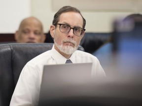 FILE - Alexander Friedmann listens during the first day of his trial at the Justice A.A. Birch Building in Nashville, Tenn., July 19, 2022. Friedmann, a longtime prison reform advocate, was sentenced to 40 years behind bars on Thursday, Oct. 6, 2022, following his conviction for hiding guns, ammunition, handcuff keys and hacksaw blades inside the walls of Nashville's new jail while it was being built.