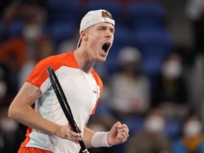 FILE PHOTO - Denis Shapovalov of Canada reacts after gaining a point against Taylor Fritz of the U.S. during their semifinal match in the Japan Open tennis championships in Tokyo, Saturday, Oct. 8, 2022. Shapovalov knocked off Britain's Dan Evans in straight sets Friday to claim a semifinal spot at the Vienna Open.
