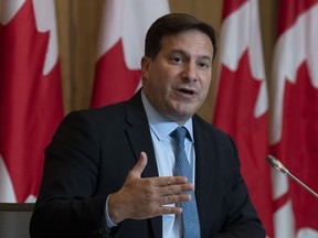 Marco Mendicino speaks during a news conference, Monday, Sept. 26, 2022 in Ottawa. The federal government says measures to freeze the number of handguns in Canada are now in effect.