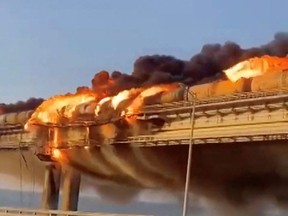 A view shows a fire on the Kerch bridge in the Kerch Strait, Crimea, Oct. 8.