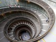 People visit the Vatican Museums on the day of its reopening after weeks of closure.