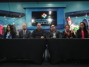 Canadian Paralympic Committee vice president Gail Hamamoto, from left to right, Whistler Mayor Jack Crompton, Musqueam Indian Band Chief Wayne Sparrow, Squamish Nation councillor Wilson Williams, Tsleil-Waututh Nation Chief Jen Thomas and Canadian Olympic Committee president Tricia Smith attend a news conference about their 2030 Olympic bid, in Vancouver, B.C., Friday, Oct. 28, 2022. The government of British Columbia said it will not support an Indigenous-led bid to host the 2030 Olympics in the province.