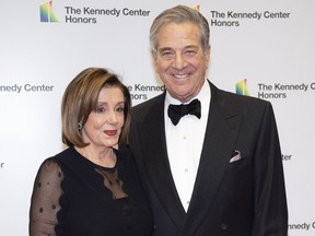 FILE - Speaker of the House Nancy Pelosi, D-Calif., and her husband, Paul Pelosi, arrive at the State Department for the Kennedy Center Honors State Department Dinner, Dec. 7, 2019, in Washington. House Speaker Nancy Pelosi's husband, Paul, was "violently assaulted" by an assailant who broke into their San Francisco home early Friday, Oct. 28, 2022, and he is now in the hospital and expected to make a full recovery, said her spokesman, Drew Hammill.