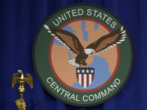 FILE - The seal for the U.S. Central Command is displayed on Feb. 6, 2017, at MacDill Air Force Base in Tampa, Fla. U.S. special operations forces conducted a raid in northeast Syria overnight, killing an Islamic State insurgent who was involved in smuggling weapons and fighters, U.S. officials said Thursday, Oct. 6, 2022. In a statement, U.S. Central Command said the helicopter raid targeted Rakkan Wahid al Shamman, who was known to facilitate the smuggling in support of IS operations.