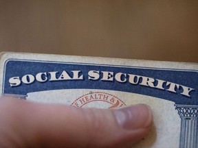 FILE - A Social Security card is displayed in Tigard, Ore., Oct. 12, 2021. Individuals will be allowed to make sure their records with the Social Security Administration align with their gender identity under a plan announced Wednesday, Oct. 19, 2022.