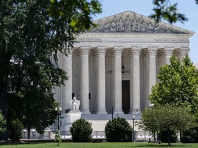 FILE - The Supreme Court is seen on Capitol Hill in Washington, July 14, 2022. The Supreme Court opens its new term on Monday, Oct. 3. The Supreme Court is taking up an Alabama redistricting case that could have far-reaching effects on minority voting power across the United States. The justices are hearing arguments Tuesday in the latest high-court showdown over the federal Voting Rights Act, lawsuits seeking to force Alabama to create a second Black majority congressional district.